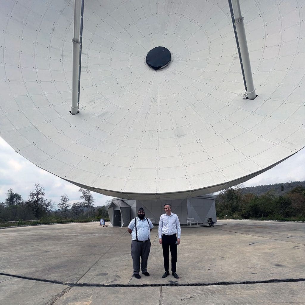 Ravit in front of an antenna