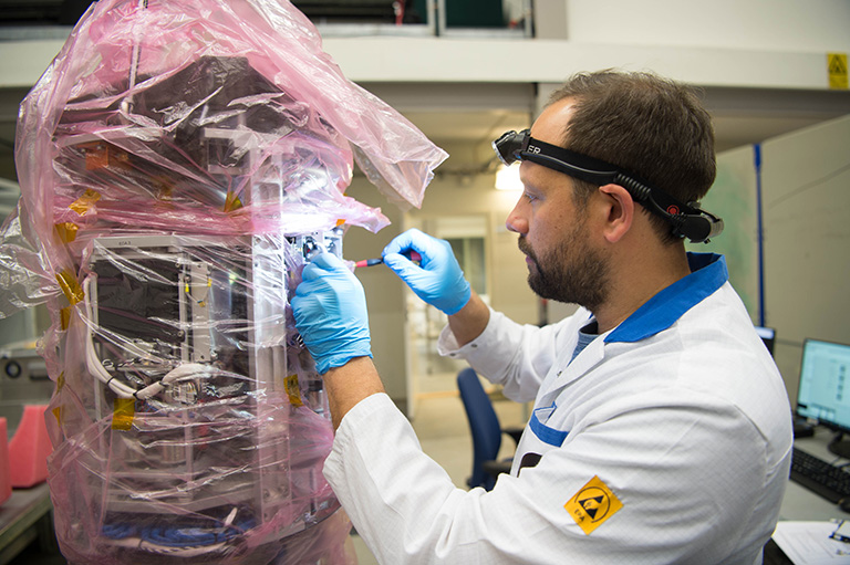 Engineer working with payload