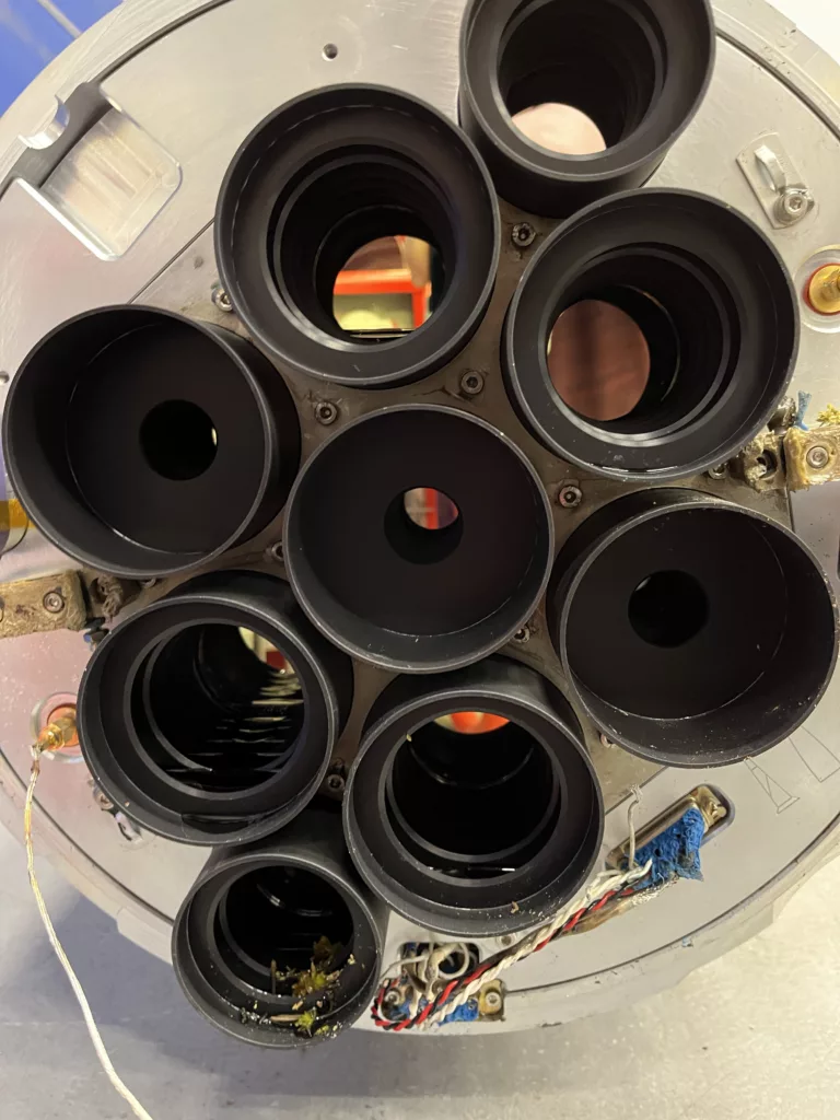 Rocket payload with multiple round, black, light sensors