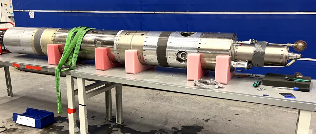 Rocket payload laying on a bench