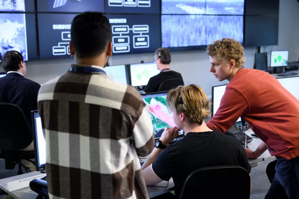 Orbital Launch Control Center at Esrange Space Center. Staff working and screens in the background.