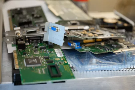 A stack of old green circuit boards