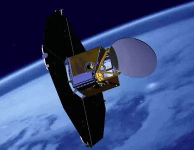 A satellite in space with the Earth in the background