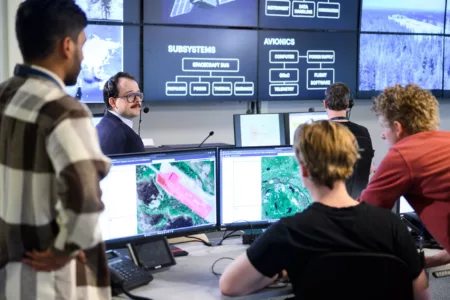 Staff in a control room.